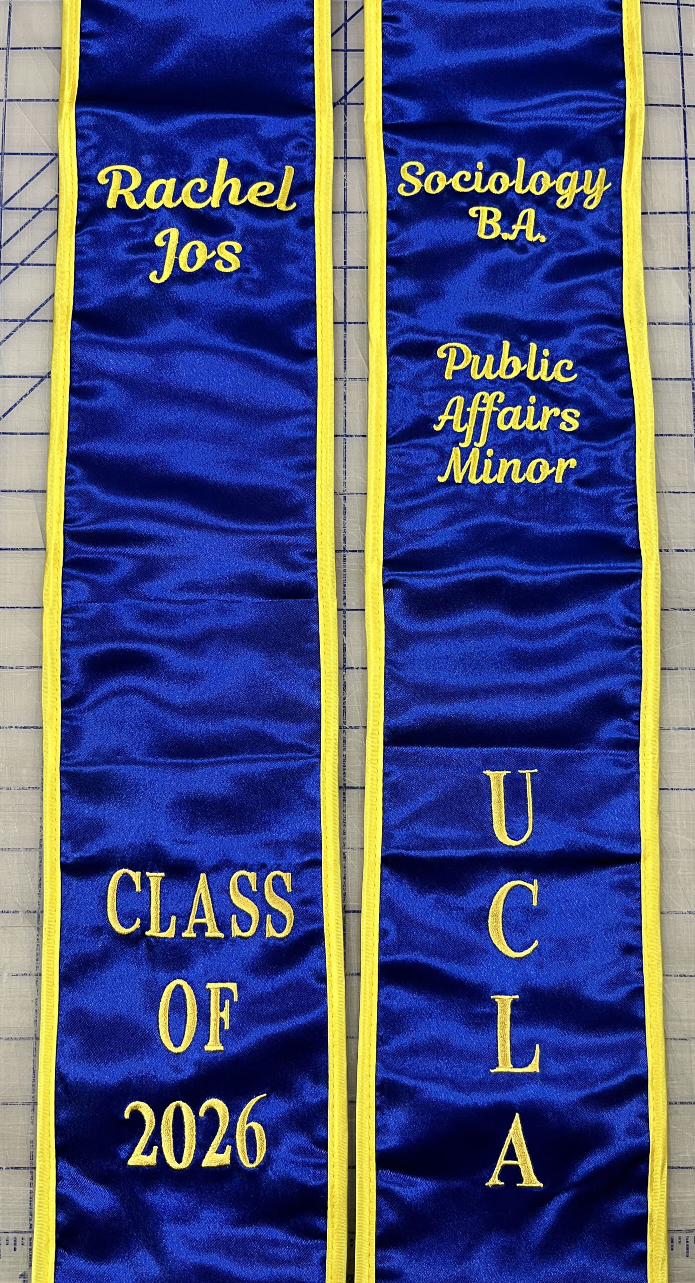 UCLA graduation stole custom embroidered with student name and organization logo near Los Angeles