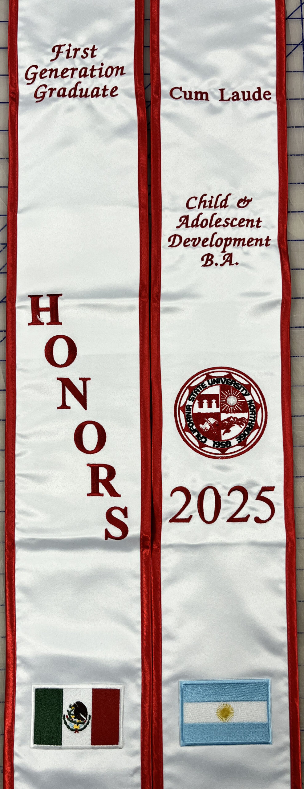 Custom embroidered graduation sash with personalized name, major, and graduation year made in Simi Valley California