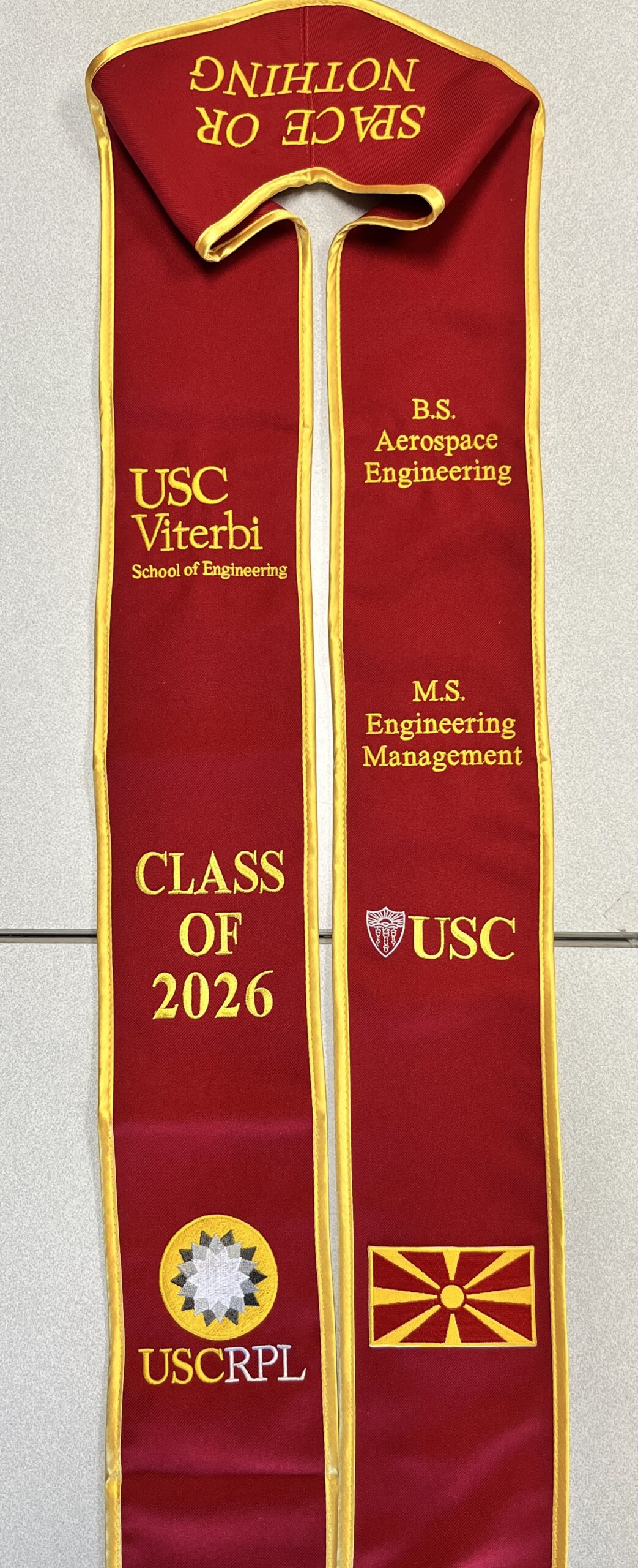Personalized graduation stole embroidery with custom club logo and honors text by Spectacolor Embroidery