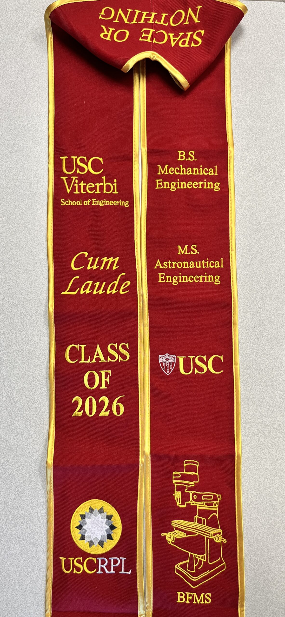 USC graduation sash with custom embroidery including major, honors, and personalized lettering