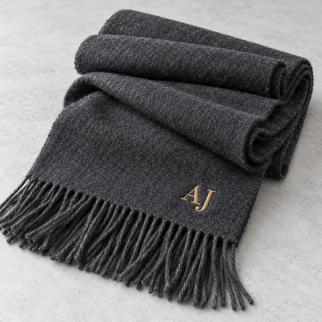 embroidered-scarf-monogram Charcoal fringed scarf personalized with gold embroidered AJ initials