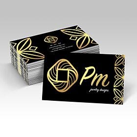 Black business cards with gold foil logos