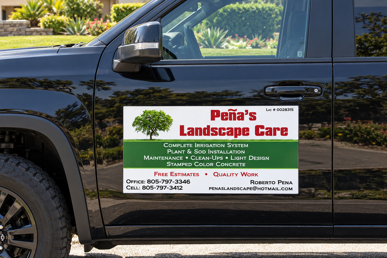 Pena Landscape Care car magnet on the door of a black pickup truck