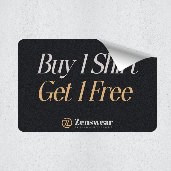 Black promotional sticker reading Buy 1 Shirt Get 1 Free Black promotional sticker reading Buy 1 Shirt Get 1 Free