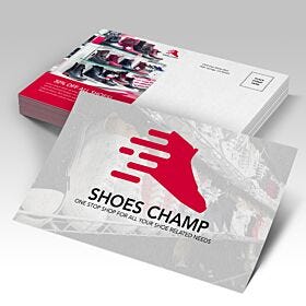 White suede finish postcards with a red shoe store logo